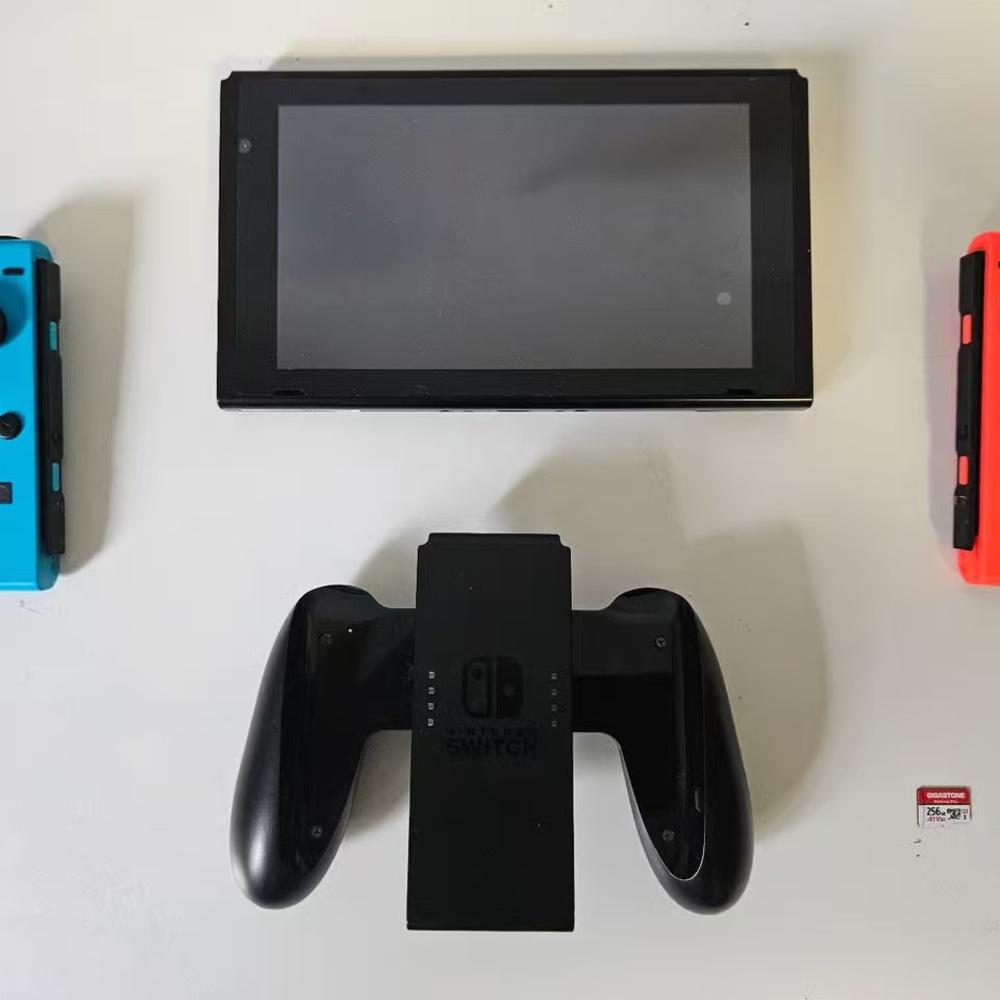 Nintendo Switch with Accessories - Picture 10 of 12